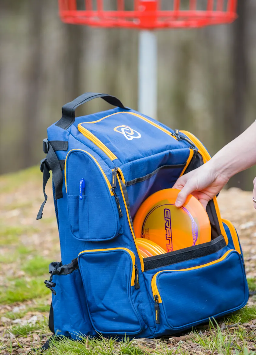 DISCOLOGY DISC GOLF IZZO BAG - DISC GOLF BACKPACK - 26  DISC CAPACITY - LARGE STORAGE CAPACITY - DURABLE, WATER AND TEAR RESISTANT
